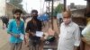 बिना मास्क के घूमने वाले लोगों पर निगम ने लगाया जुर्माना